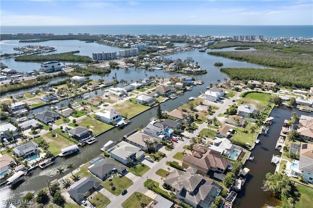 bird's eye view with a water view