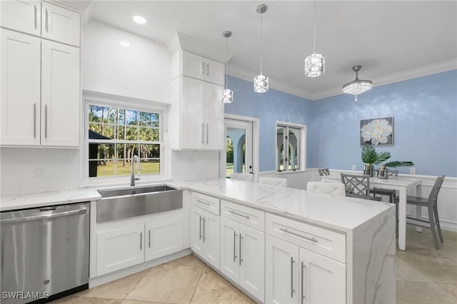 kitchen with sink, white cabinets, kitchen peninsula, and dishwasher