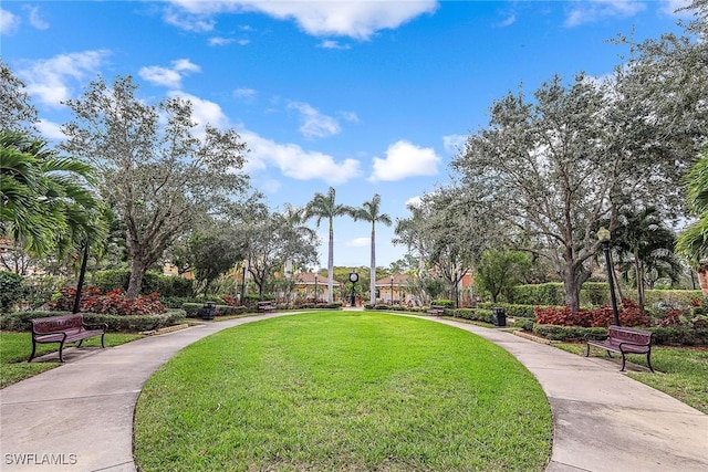 view of home's community with a lawn
