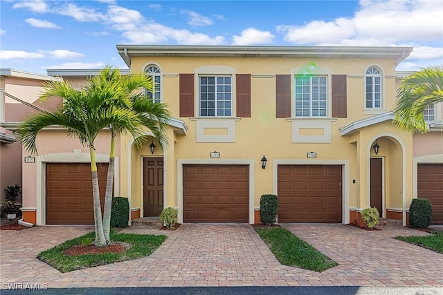 view of front of home with a garage