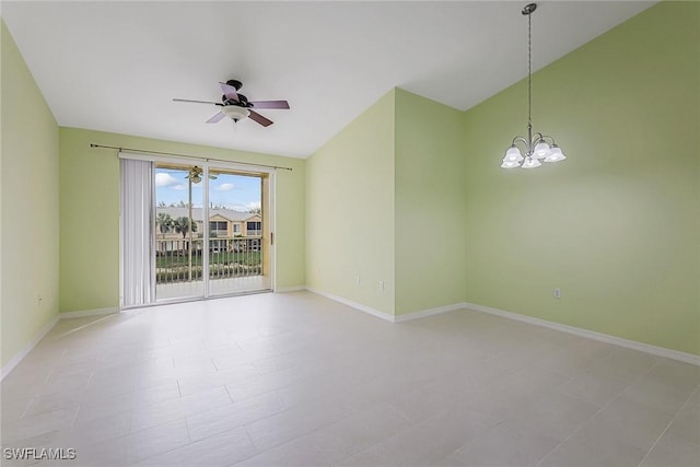 unfurnished room featuring vaulted ceiling and ceiling fan with notable chandelier