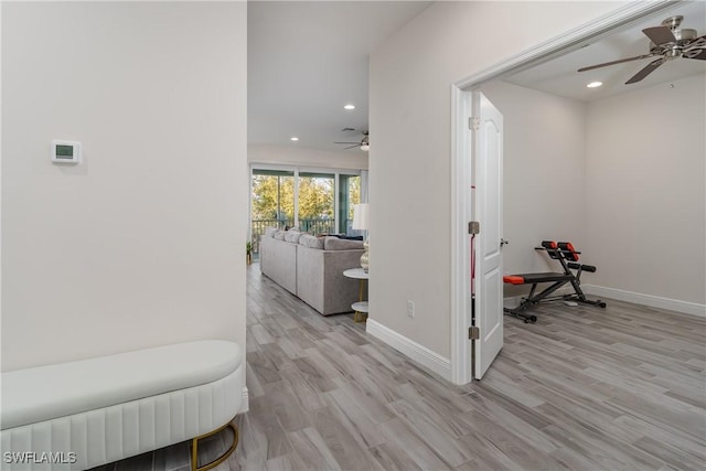 hallway with light wood-type flooring