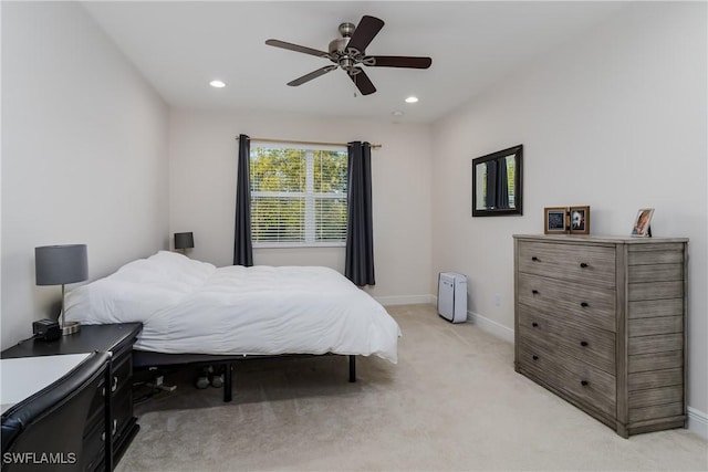 carpeted bedroom featuring ceiling fan