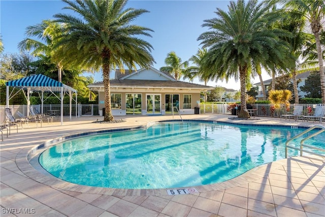 view of pool featuring a patio area