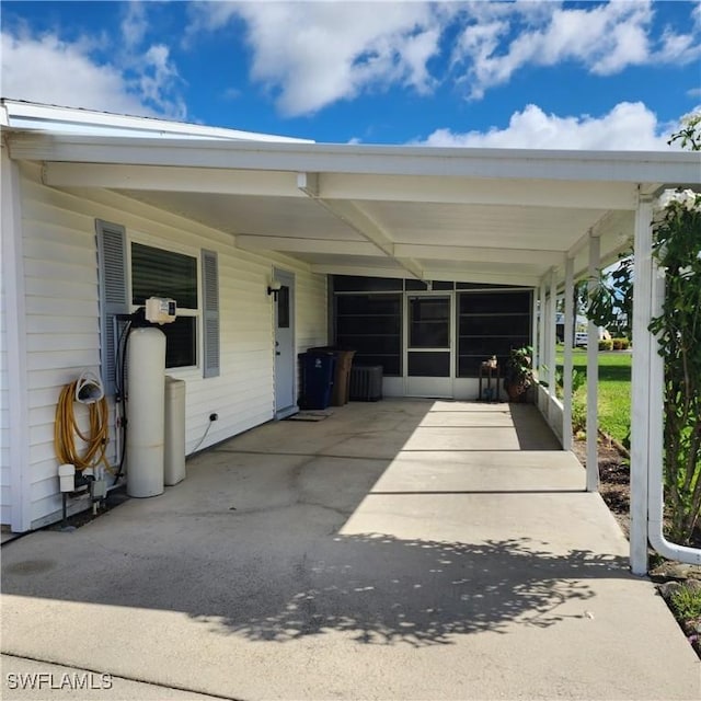 view of patio featuring a carport