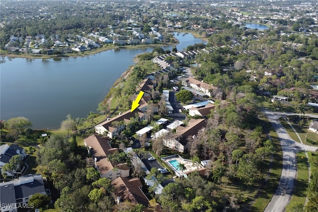 bird's eye view with a water view