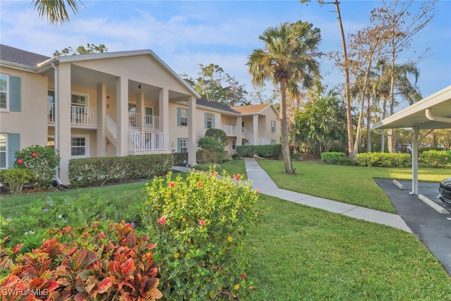 exterior space with a lawn