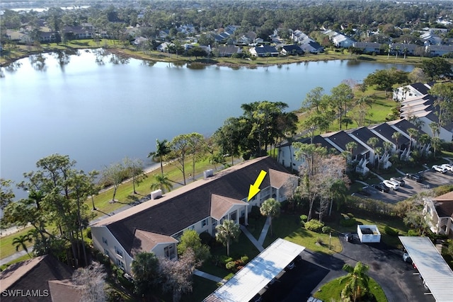 bird's eye view with a water view and a residential view