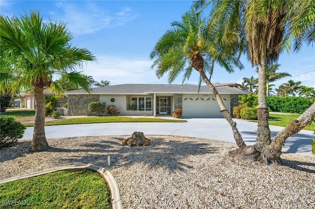 ranch-style home with a garage