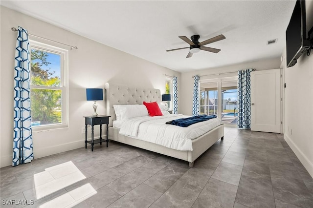 bedroom featuring access to outside and ceiling fan