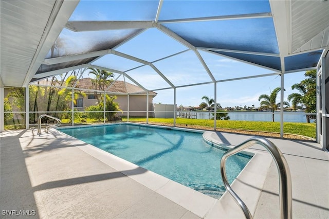 view of pool featuring a water view, glass enclosure, and a patio area