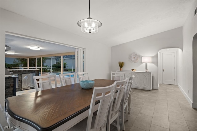 dining space with light tile patterned floors