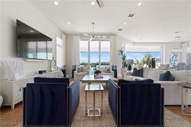 5997 Cypress Ln, Bonita Springs, FL 34134 - living room with plenty of natural light, ceiling fan, and visible vents