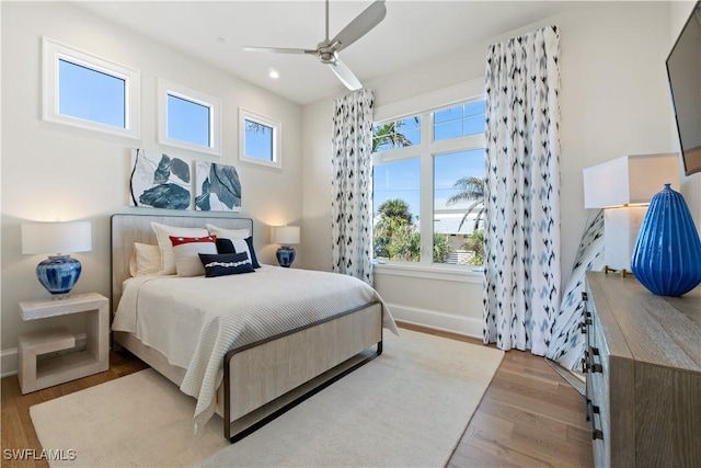 5997 Cypress Ln, Bonita Springs, FL 34134 - bedroom featuring baseboards, a ceiling fan, recessed lighting, and wood finished floors