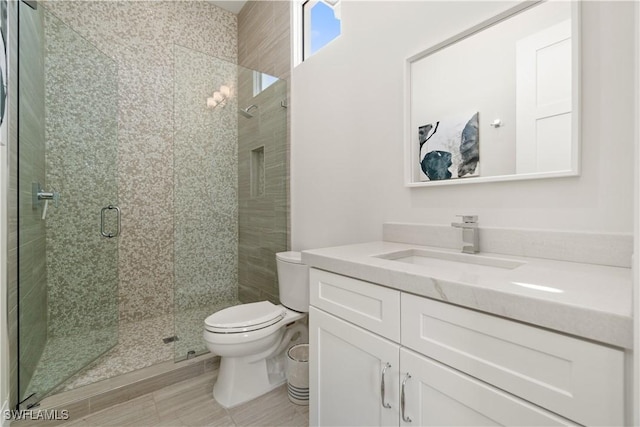 5997 Cypress Ln, Bonita Springs, FL 34134 - bathroom featuring toilet, tile patterned floors, a shower stall, and vanity
