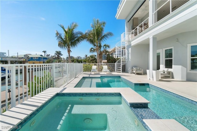 5997 Cypress Ln, Bonita Springs, FL 34134 - view of swimming pool featuring fence, a patio, a fenced in pool, an in ground hot tub, and stairway