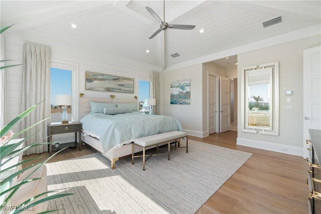 bedroom featuring vaulted ceiling, wood-type flooring, and ceiling fan