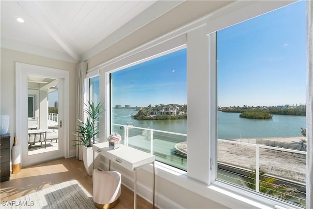 5997 Cypress Ln, Bonita Springs, FL 34134 - sunroom featuring a water view and a healthy amount of sunlight