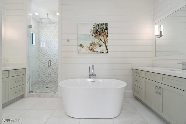 bathroom featuring vanity, wooden walls, and plus walk in shower