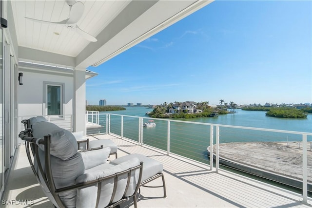 5997 Cypress Ln, Bonita Springs, FL 34134 - balcony featuring a water view and ceiling fan