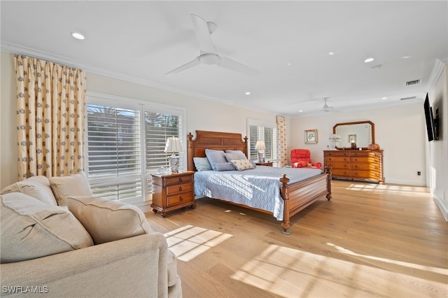 bedroom with light wood-type flooring, ornamental molding, and ceiling fan