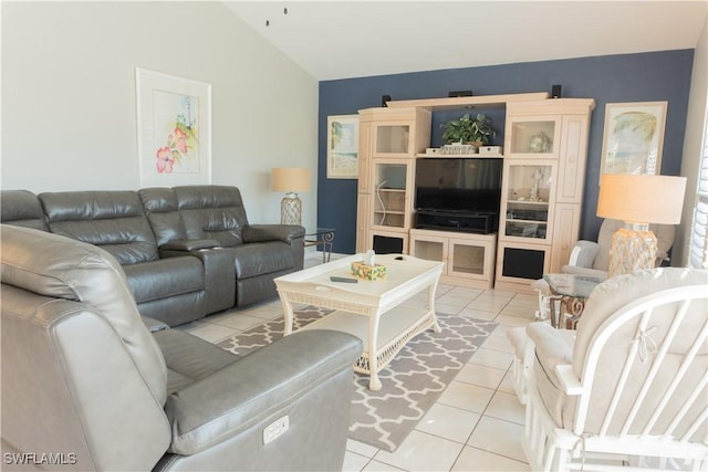 tiled living room with lofted ceiling