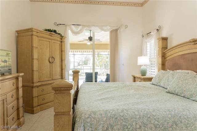 bedroom with light tile patterned floors and access to outside