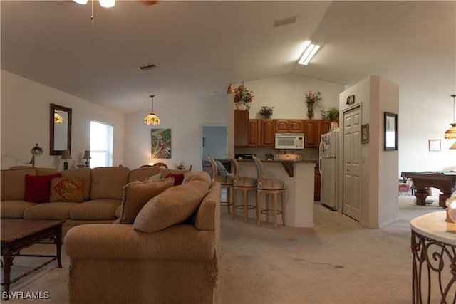 living room featuring light carpet, high vaulted ceiling, and billiards