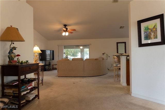 carpeted living room featuring lofted ceiling and ceiling fan