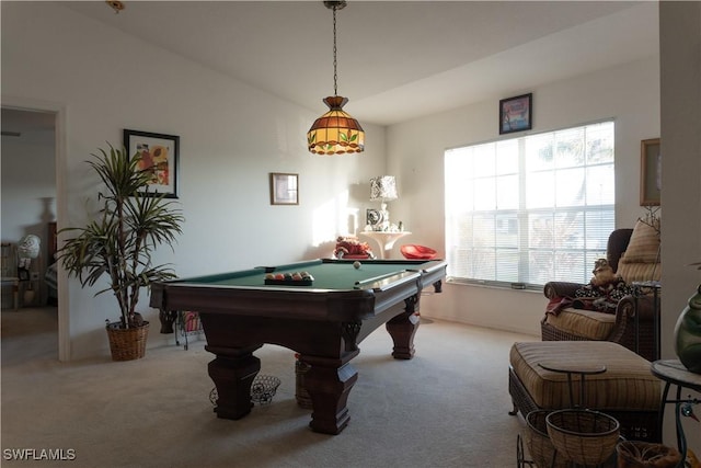 rec room with billiards, vaulted ceiling, and light colored carpet