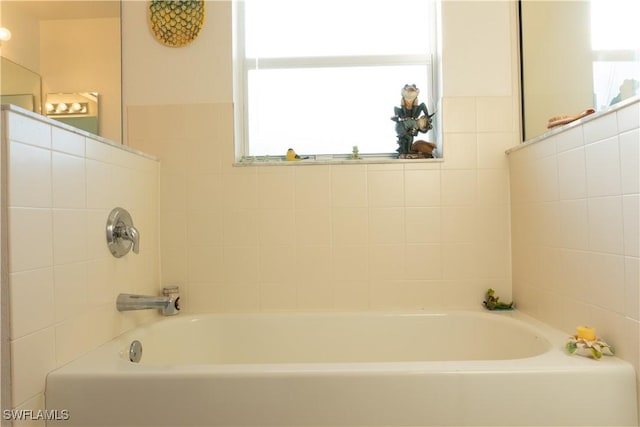 bathroom featuring a washtub