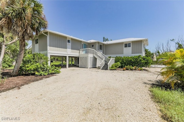 view of front of home with a carport