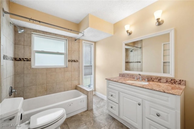 bathroom featuring toilet, vanity, shower / tub combination, a textured ceiling, and baseboards