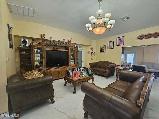 living room with an inviting chandelier