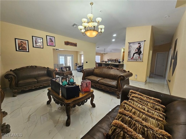 living room with a notable chandelier