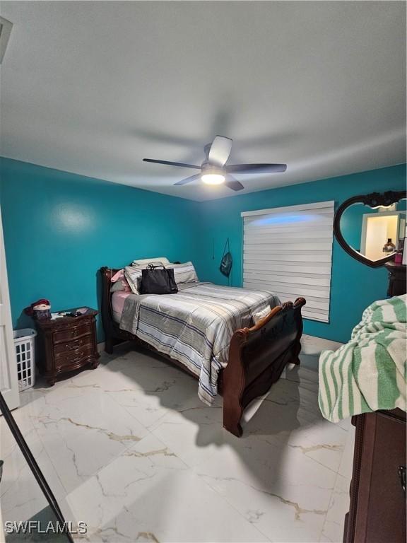 bedroom featuring ceiling fan