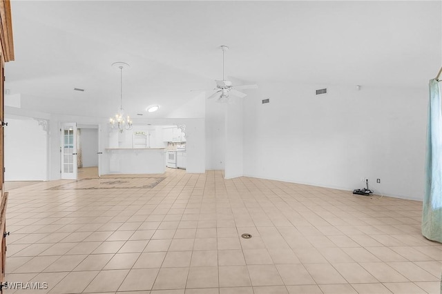 unfurnished living room with light tile patterned floors, ceiling fan with notable chandelier, and high vaulted ceiling