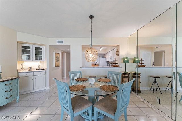 view of tiled dining space