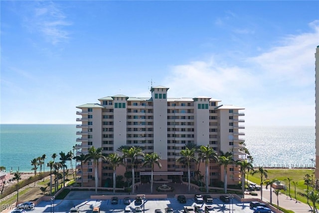 view of building exterior featuring a water view