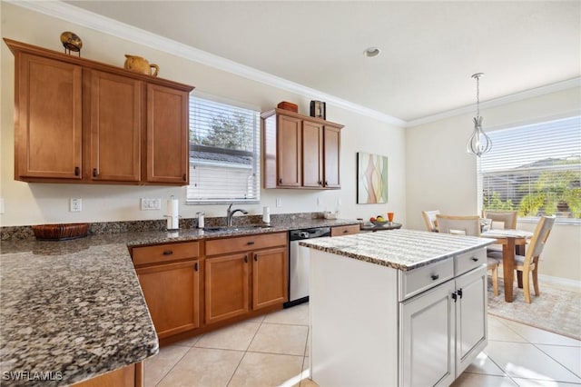 kitchen featuring dishwasher, ornamental molding, brown cabinets, and a sink