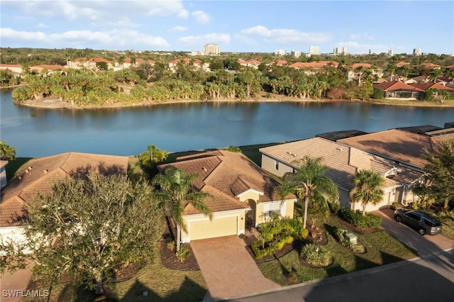 bird's eye view with a water view