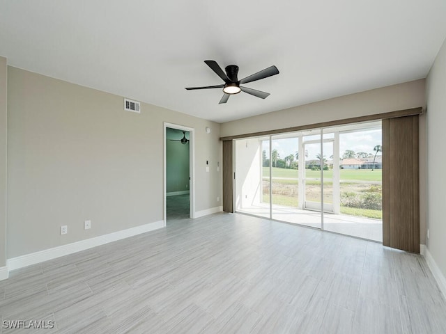 unfurnished room featuring ceiling fan