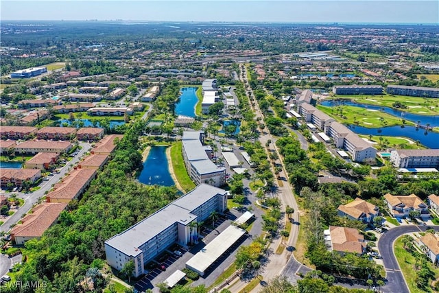 aerial view featuring a residential view and a water view