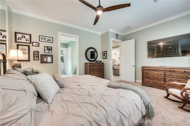 bedroom featuring ornamental molding, carpet flooring, ensuite bathroom, and ceiling fan