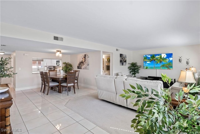 living room with light tile patterned floors