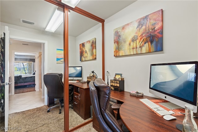 office space with light tile patterned flooring