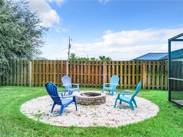 view of patio with an outdoor fire pit