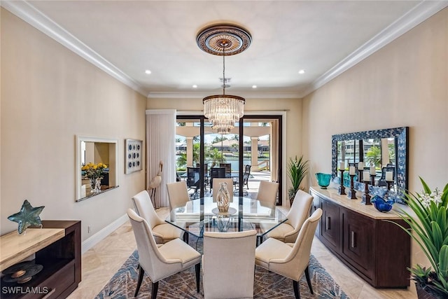 dining room featuring crown molding and a notable chandelier