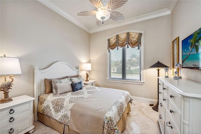 bedroom featuring ceiling fan and ornamental molding