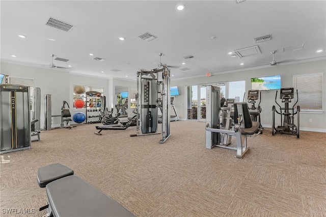 gym with light carpet and ornamental molding